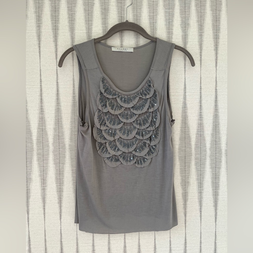 Cotton tank with detailed silver beading. Fits small to medium.